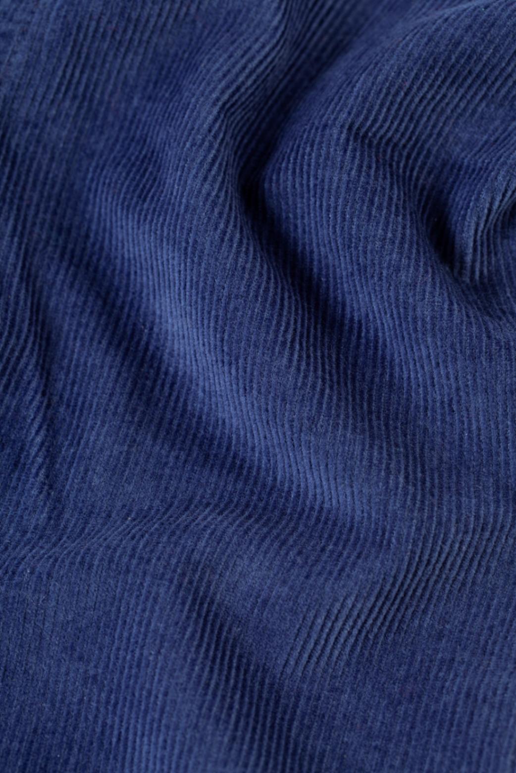 Cord-Latzhose von Frugi mit Haus-Motiv